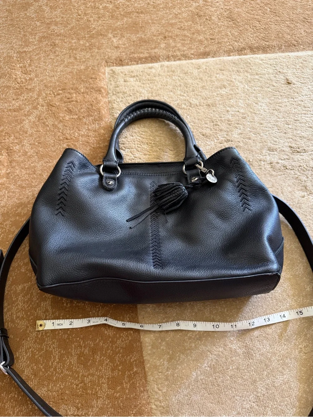 The Sak Black Leather Tote Bag with Tassel Accent